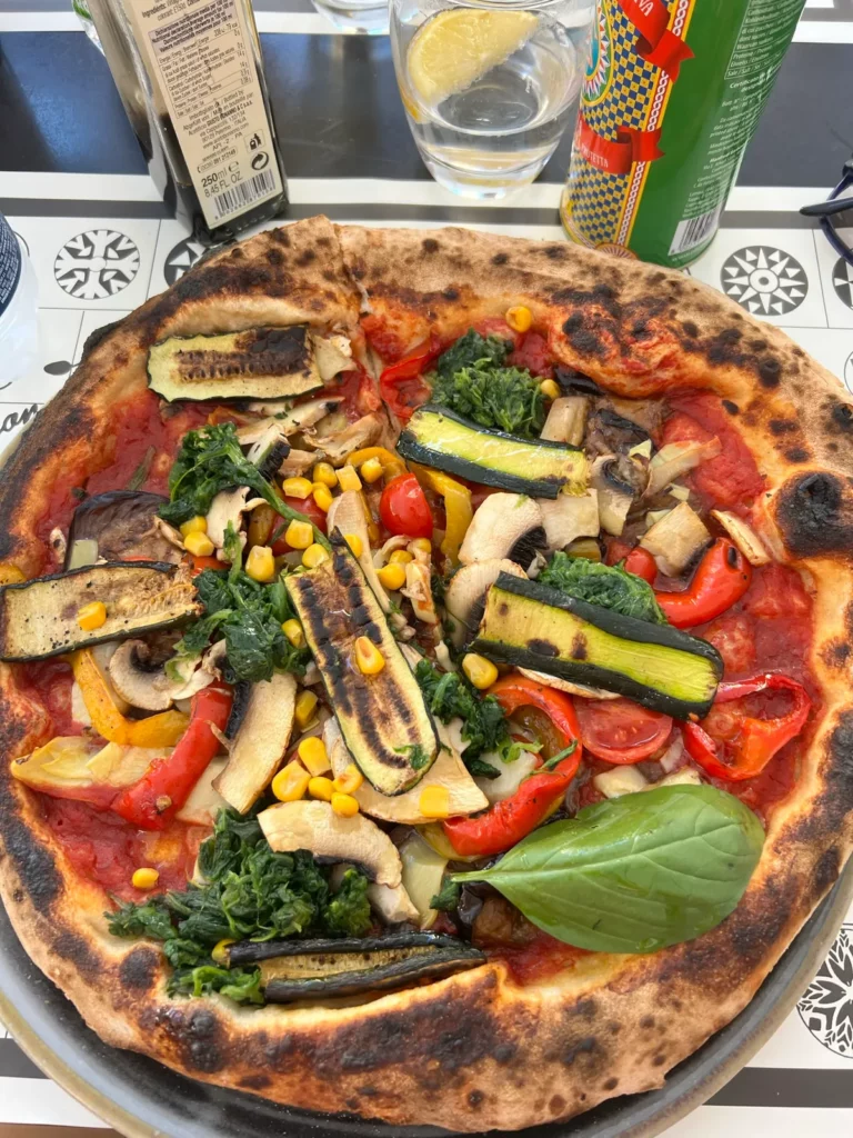 Italian pizza with vegetable toppings.
