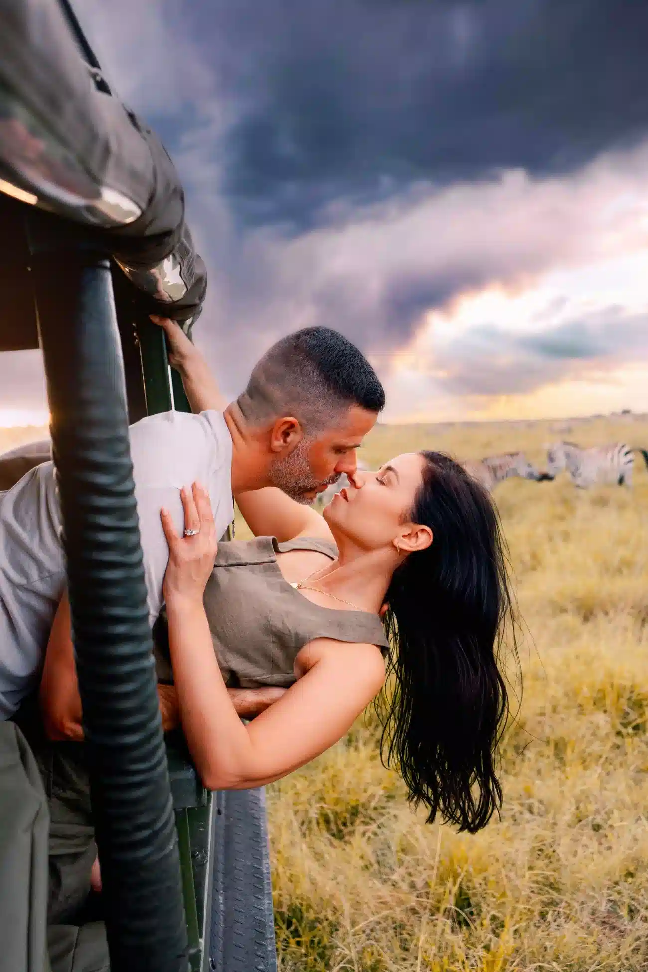Couple sharing a romantic African safari honeymoon moment in Kenya.